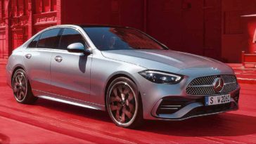 Mercedes-Benz C-Class 2022 W206 metallic grey front view in red background