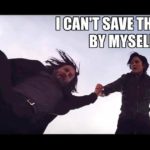 Trinity dressed in black clothes holds neo by his hand while hovering in the air